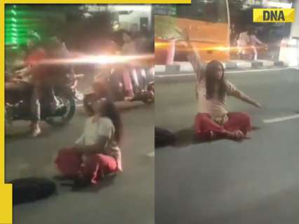 Woman sits on road in Lucknow, shakes head for 20 min, viral video leaves netizens stunned